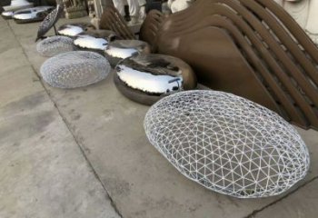 房地產鵝卵石雕塑廠家 鏤空擺件 鍛造不銹鋼鵝卵石雕塑