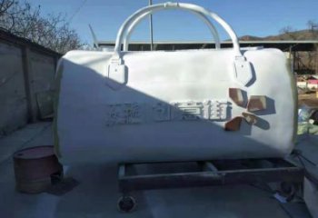 庭院提包雕塑廠(chǎng)家 廣場(chǎng)小品 鍛造不銹鋼提包雕塑制作