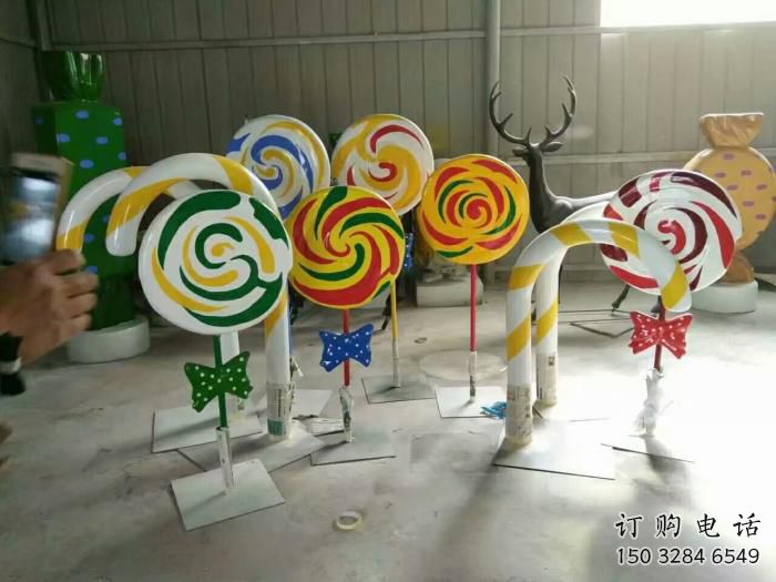 園林糖果雕塑廠家 街頭現(xiàn)代小品 中式不銹鋼糖果雕塑廠