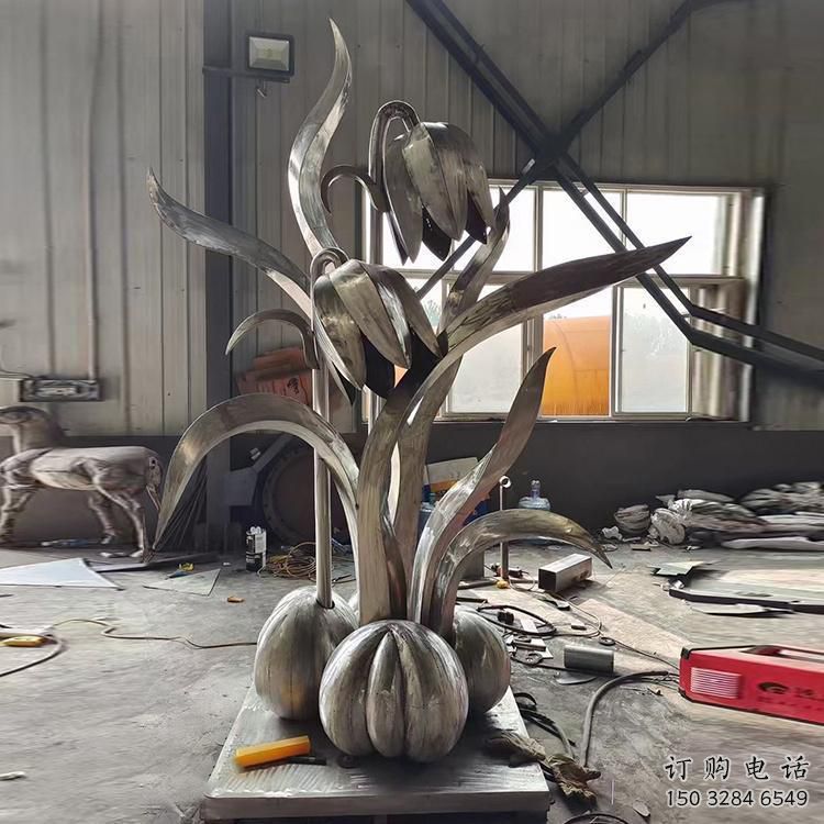 現(xiàn)代玉蘭花雕塑廠家 大型別墅區(qū)擺件  創(chuàng)意不銹鋼玉蘭花雕塑