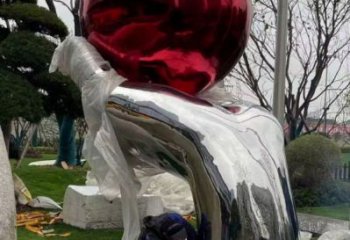 火球雕塑觀賞型，小區(qū)雕塑，不銹鋼手托火球雕塑優(yōu)價(jià)